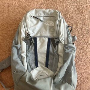 North face gray and navy backpack